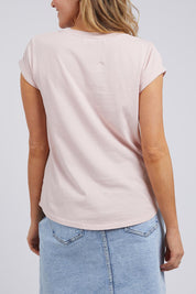 A model wearing the Elements Manly Cotton Tee in colour Pnklotus (Pink), from the back