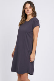 A model wearing the Elements Manly Tee Dress in colour Coal (Grey), from the front, cropped image
