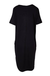 Product shot of the Elements Bay Cotton Dress in colour Black (Black), from the back