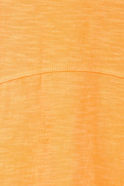 Product shot of the Elements Bay Cotton Dress – Melon in colour Melon, showing detail