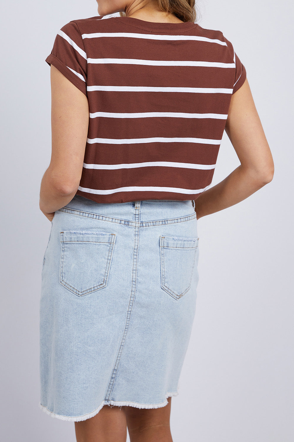 A model wearing the Elements Manly Stripe Cotton Tee in colour Chocstripe, from the back