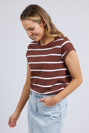 A model wearing the Elements Manly Stripe Cotton Tee in colour Chocstripe, from the front, cropped image