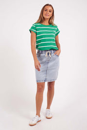 A model wearing the Elements Manly Stripe Cotton Tee in colour Greenwhite (Green), from the front, showing the whole outfit