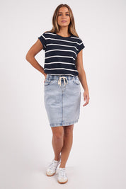 A model wearing the Elements Manly Stripe Cotton Tee in colour Navywhite (Blue), from the front, showing the whole outfit