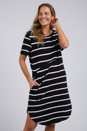 A model wearing the Elements Bay Stripe Dress in colour Blackwhite (Black), from the front, cropped image