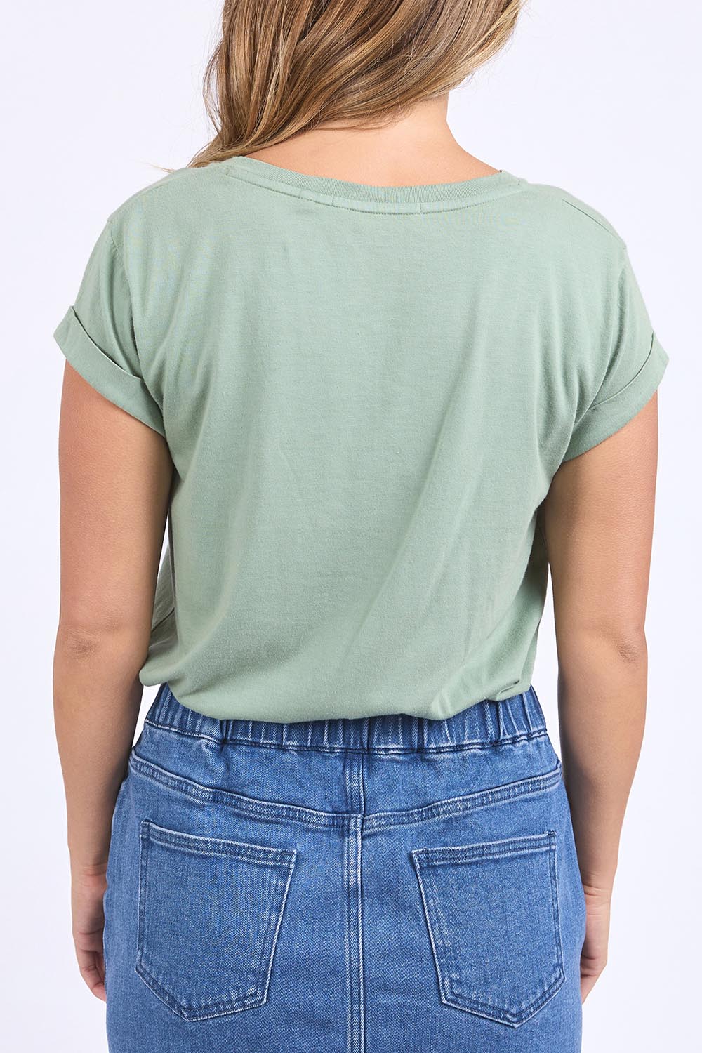 A model wearing the Elements Manly Cotton Vee Tee in colour Iceberggre (Green), from the back