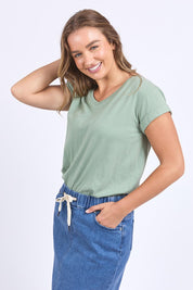 A model wearing the Elements Manly Cotton Vee Tee in colour Iceberggre (Green), from the front, cropped image