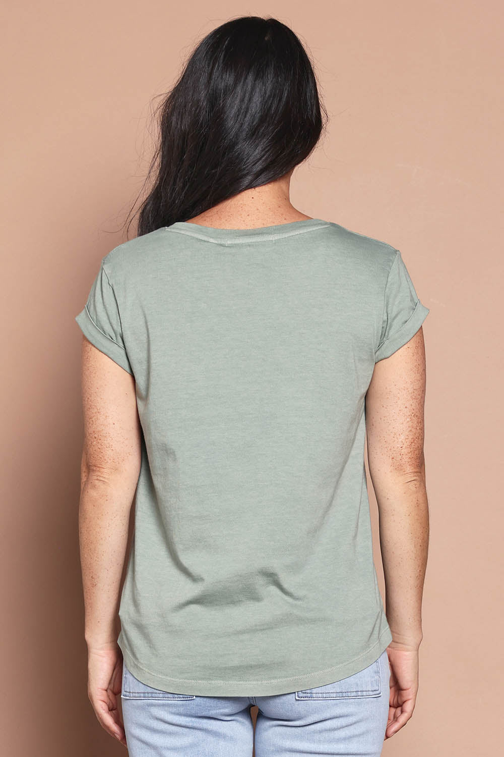 Model Katie wearing size 8 of the Elements Manly Cotton Vee Tee in colour Iceberggre (Green), from the back