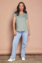 Model Katie wearing size 8 of the Elements Manly Cotton Vee Tee in colour Iceberggre (Green), from the front, showing the whole outfit