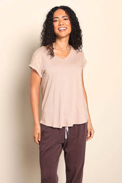 Model Pamelar wearing size 10 of the Elements Manly Cotton Vee Tee - Oat in colour Oat, in a cropped view