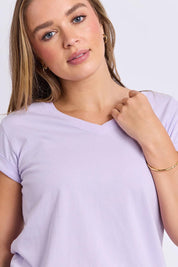 Model Genericm wearing size sample of the Elements Manly Cotton Vee Tee – Pastellila in colour Pastellila, in a cropped view