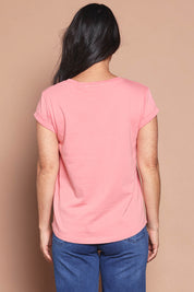 Model Katie wearing size 8 of the Elements Manly Cotton Vee Tee in colour Rosepink (Pink), from the back