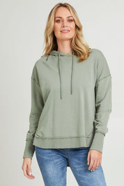 Model Grace wearing size 10 of the Elements Sigrid Hoody in colour Sagegreen (Green), from the front, cropped image