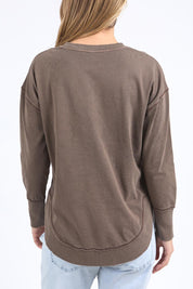 A model wearing the Elements Farrah Cotton Long Sleeve in colour Coffee, from the back