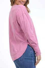 A model wearing the Elements Farrah Cotton Long Sleeve in colour Rosepink (Pink), from the back