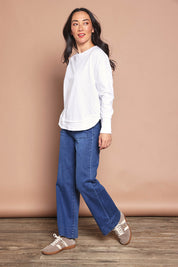Model Katie wearing size 8 of the Elements Farrah Cotton Long Sleeve in colour White (White), from the front, showing the whole outfit