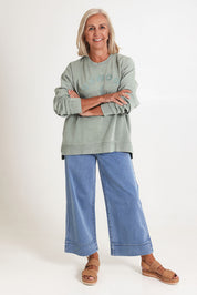 Model Sandy wearing size 10 of the Effortless Cotton Crew in colour Iceburggre (Green), from the front, showing the whole outfit