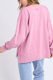 A model wearing the Effortless Cotton Crew in colour Rosepink (Pink), from the back
