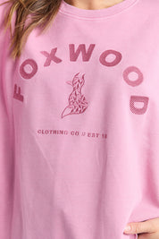 A model wearing the Effortless Cotton Crew in colour Rosepink (Pink), from the front, cropped image
