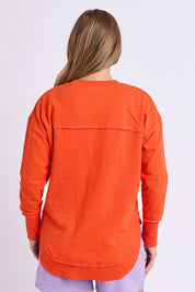 Model Genericm wearing size sample of the Elements Simplified Metallic Cotton Crew - Grenadine in colour Grenadine, from the back