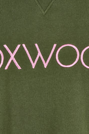 Product shot of the Elements Simplified Metallic Cotton Crew in colour Olivepink (Green), detail