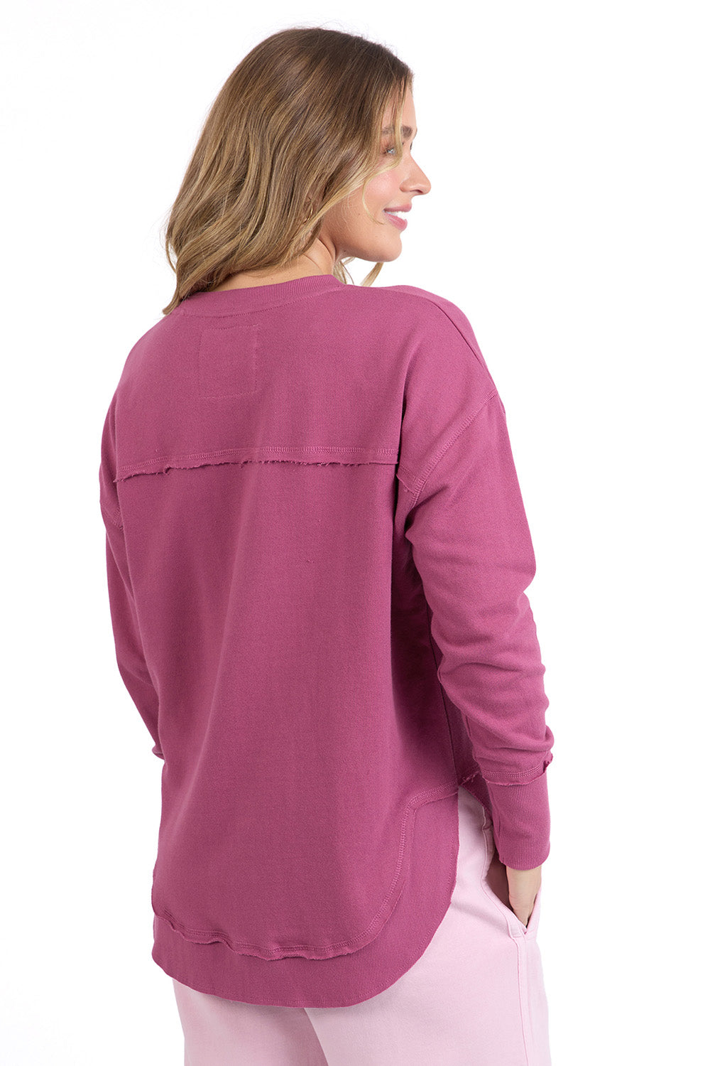 A model wearing the Elements Simplified Metallic Cotton Crew in colour Portsilver (Pink), from the back