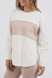 A model wearing the Leisure Simplified Tonal Crew in colour Vinwhite (White), from the front, cropped image