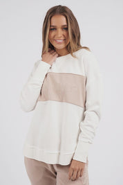 A model wearing the Leisure Simplified Tonal Crew in colour Vinwhite (White), from the front, cropped image