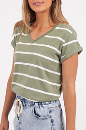 A model wearing the Elements Manly Stripe Vee Cotton Tee in colour Sagewhite (Green), from the front, cropped image
