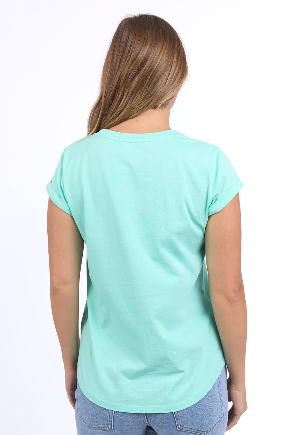 A model wearing the Elements Effortless Tee in colour Neonmint (Green), from the front, cropped image