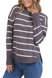 A model wearing the Elements Farrah Stripe Cotton Long Sleeve in colour Irongrywhi (Grey), from the front, cropped image