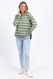 A model wearing the Elements Farrah Stripe Cotton Long Sleeve in colour Sagewhite (Green), from the front, showing the whole outfit