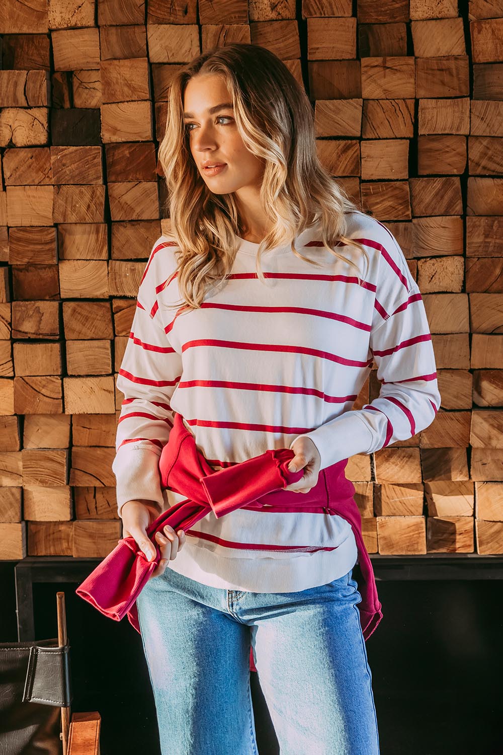 A model wearing the Elements Farrah Stripe Cotton Long Sleeve in colour Whibeetred (White), from the front, showing the whole outfit