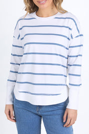 A model wearing the Elements Farrah Stripe Cotton Long Sleeve in colour Whicoronet (White), from the front, cropped image