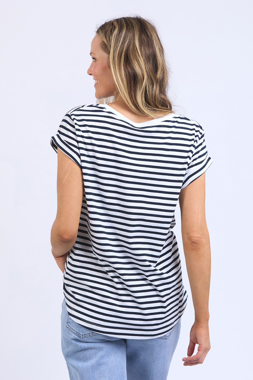 A model wearing the Elements Signature Stripe Cotton Tee in colour Navywhite (Blue), from the back