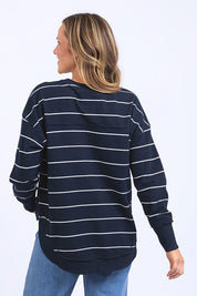 A model wearing the Elements Classic Simplified Stripe Crew in colour Navystripe (Blue), from the back