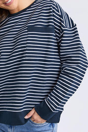 A model wearing the Elements Original Stripe Crew in colour Navywhite (Blue), from the front, cropped image