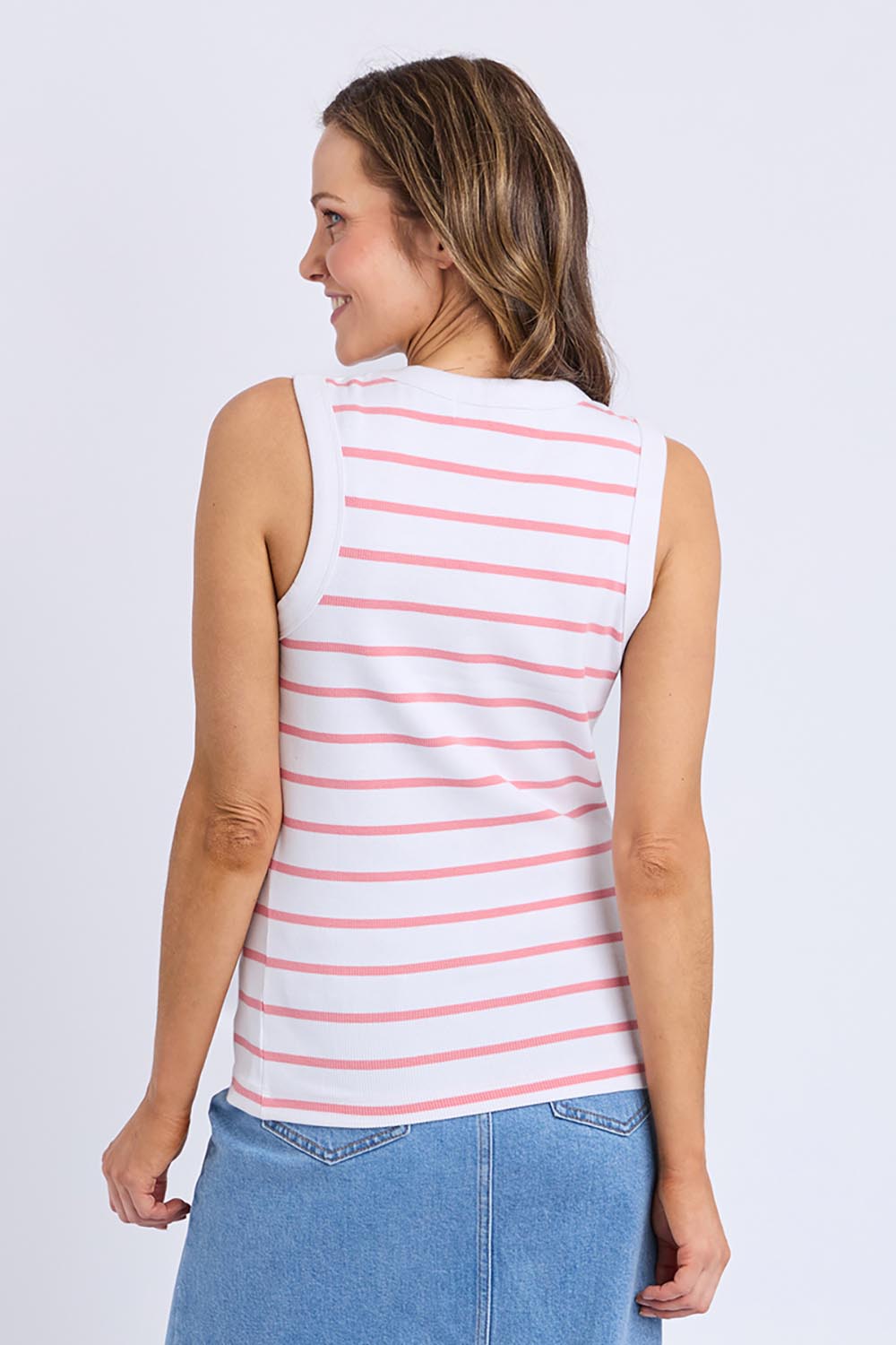 A model wearing the Elements Iris Cotton Tank in colour Whitepink (Pink), from the back
