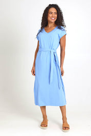 Model Pamelar wearing size 10 of the Elements Casey Cotton Dress – Cornflower in colour Cornflower, from the front