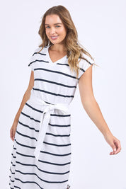 A model wearing the Elements Casey Cotton Stripe Dress in colour Whitenavy (Blue), from the front, cropped image
