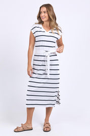 A model wearing the Elements Casey Cotton Stripe Dress in colour Whitenavy (Blue), from the front, showing the whole outfit