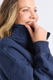 A model wearing the Elements Cotton College Zip Crew in colour Navystripe (Blue), from the front, cropped image