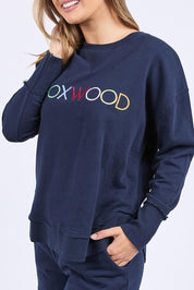 A model wearing the Elements Simplified Confetti Cotton Crew in colour Navy (Blue), from the front, cropped image