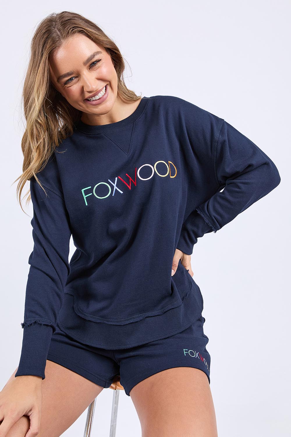 A model wearing the Elements Simplified Confetti Cotton Crew in colour Navy (Blue), from the front, cropped image