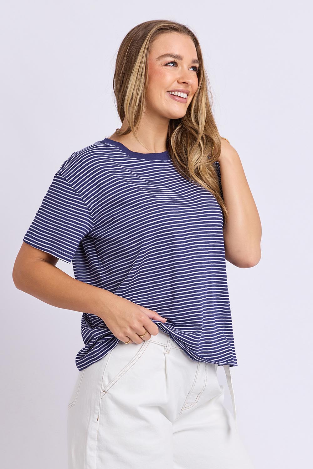 Model Genericm wearing size sample of the Elements Hutch Stripe Cotton Tee – Navywhite in colour Navywhite, from an angle