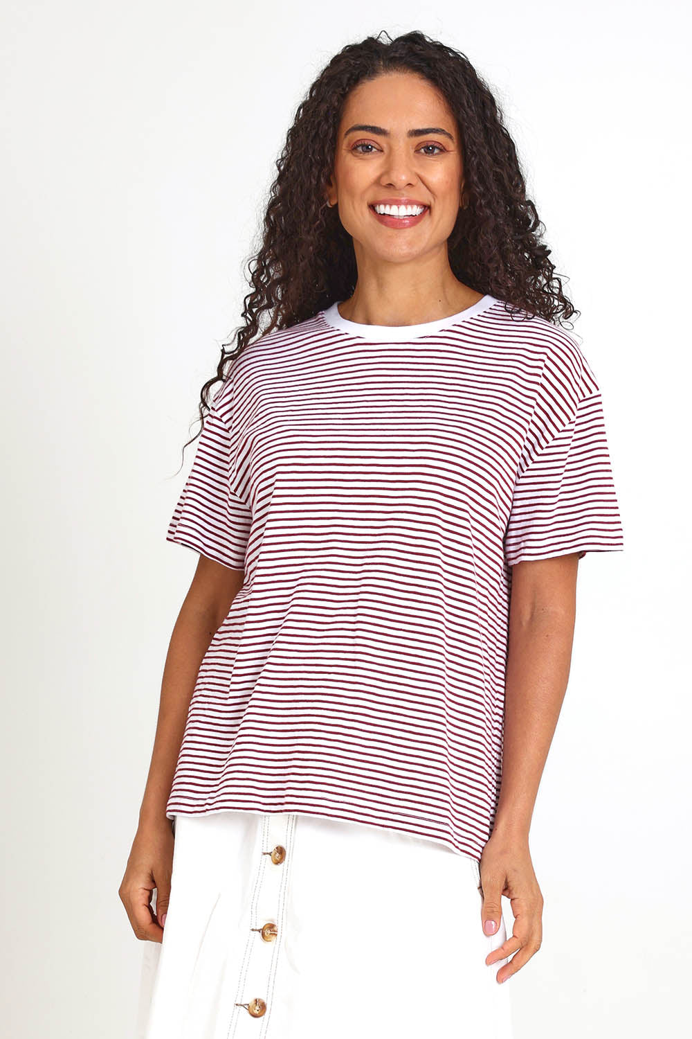 Model Pamelar wearing size 10 of the Elements Hutch Stripe Cotton Tee – Russetbrow in colour Russetbrow, in a cropped view