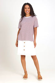 Model Pamelar wearing size 10 of the Elements Hutch Stripe Cotton Tee – Russetbrow in colour Russetbrow, from the front
