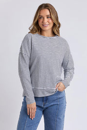 A model wearing the Elements Eddie Stripe Long Sleeve in colour Blackwhite (Black), from the front, cropped image