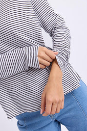 Model Genericm wearing size sample of the Elements Hutch Stripe Cotton Long Sleeve Tee - Whiteblack in colour Whiteblack, from an angle