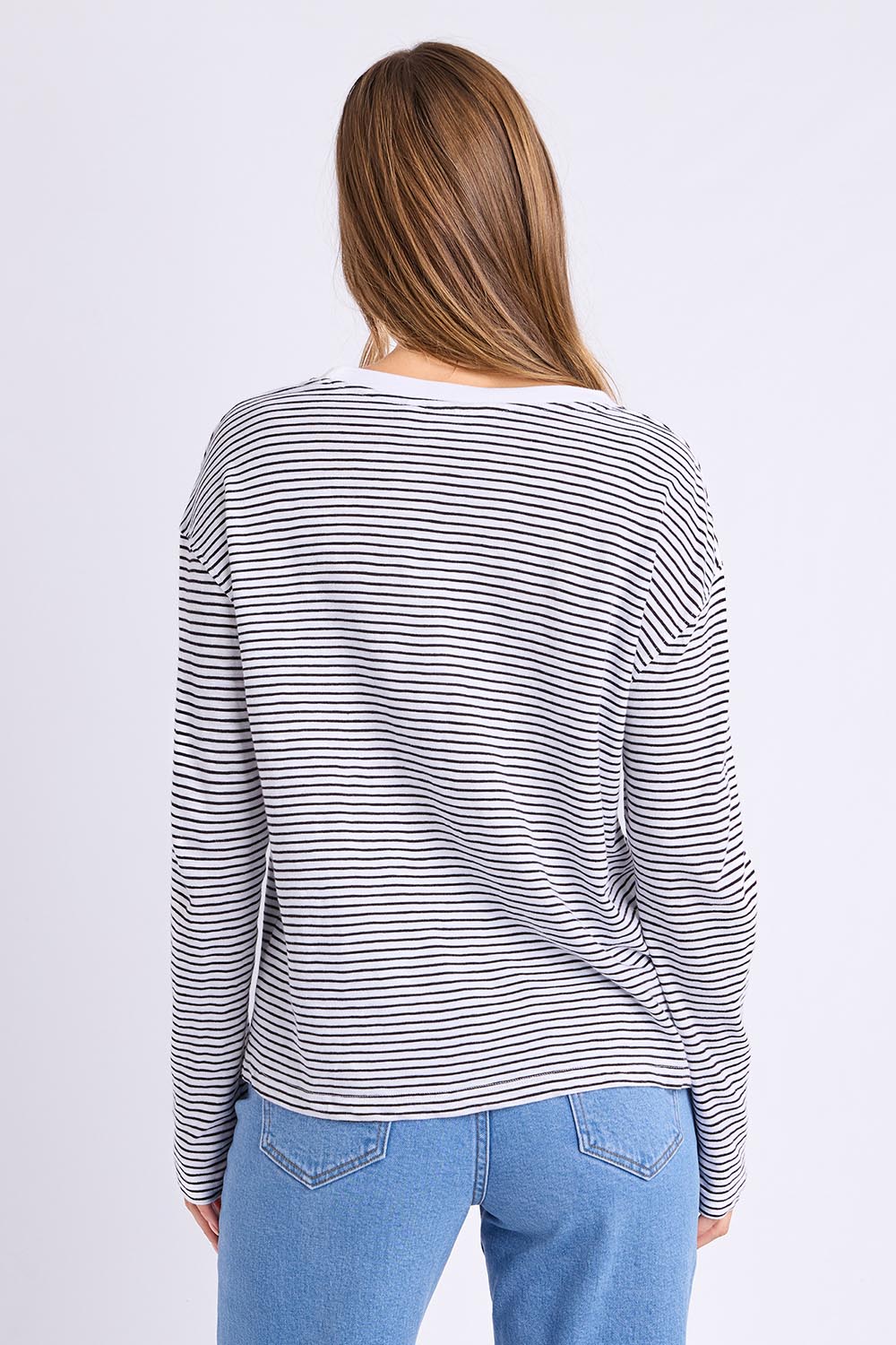 Model Genericm wearing size sample of the Elements Hutch Stripe Cotton Long Sleeve Tee - Whiteblack in colour Whiteblack, from the back